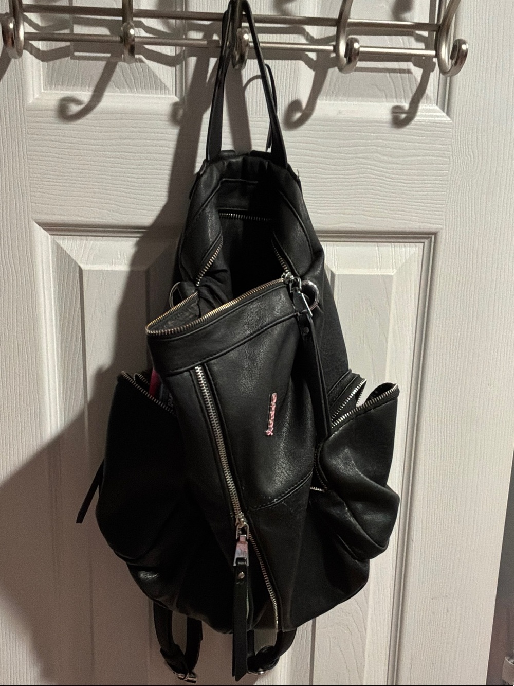 Black Leather Backpack with Pink Accent - Casual Men’s Bag